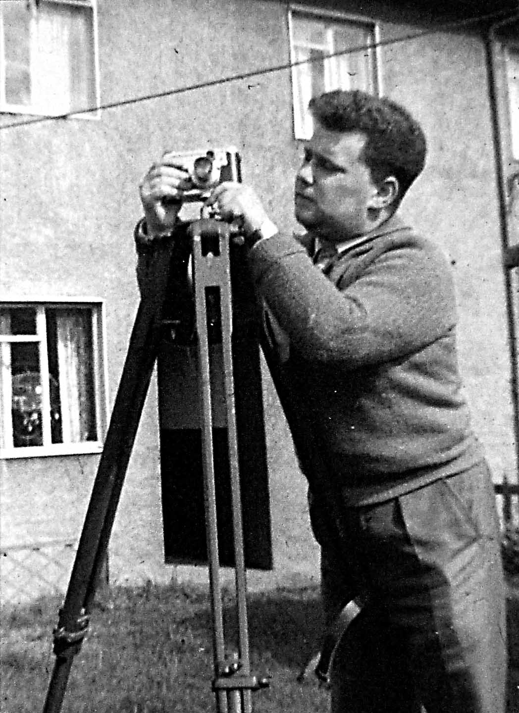 Harry Ford in late 1950s prepares his camera for night photography